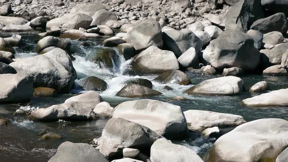 Rocky River On Sunny Day