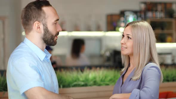 Portrait Smiling Businessman and Happy Businesswoman Enjoying Talking Having Informal Meeting