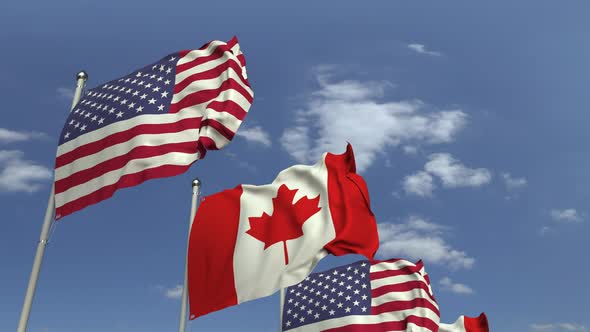 Row of Waving Flags of Canada and the USA