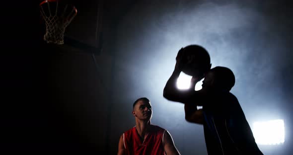 Sportsmen playing basketball