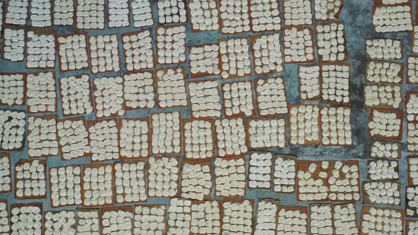 Aerial view of Women at work on the preparation of fiber, Barga, Bangladesh.