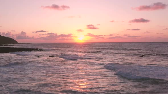 A view of a beautiful sunset in the beach