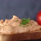 Spreading chopped parsley over tuna paste on toast - VideoHive Item for Sale