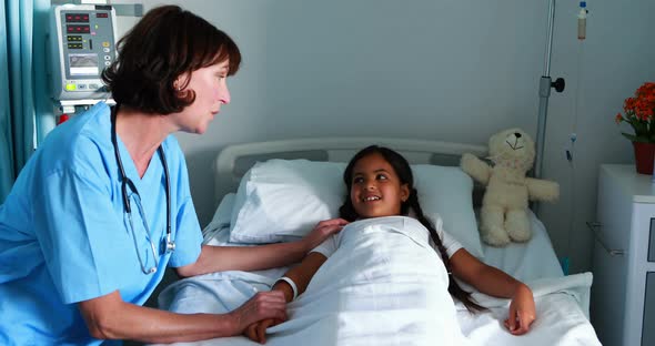 Female doctor interacting with patient