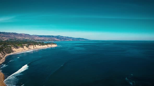 Deserted Wild El Matador Beach Malibu California Aerial Ocean View - Waves with Rocks