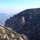 Aerial rising shot of mountain range of Montserrat, Spain - VideoHive Item for Sale