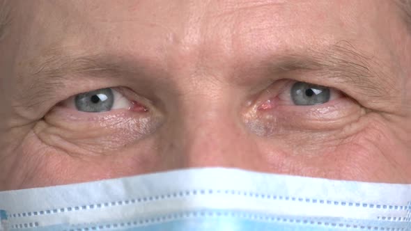 Cheerful Eyes of Mature Doctor