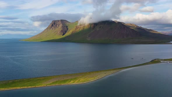 Iceland. Aerial view on the coast, mountains and ocean. Beach and sea from air.