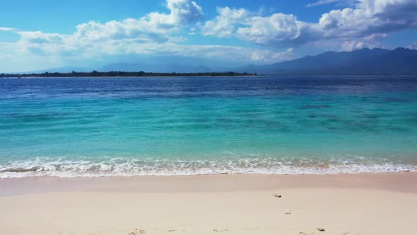 Aerial drone seascape of perfect island beach holiday by shallow ocean and white sand background of 