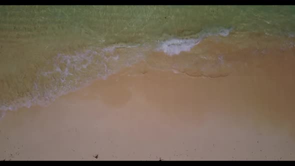 Aerial view tourism of idyllic seashore beach voyage by blue ocean and white sand background of adve