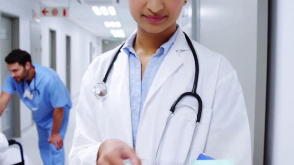 Doctor examining reports at the hospital