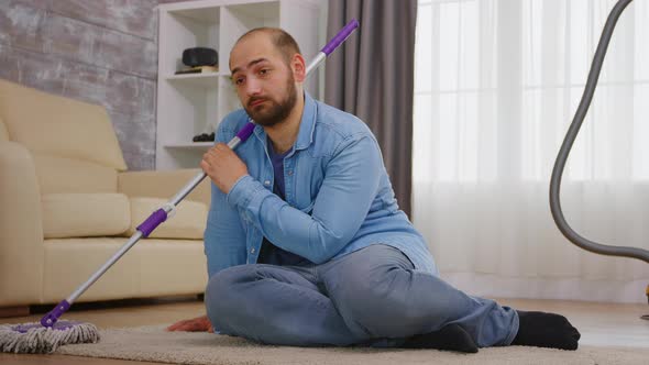 Tired Man After Housekeeping