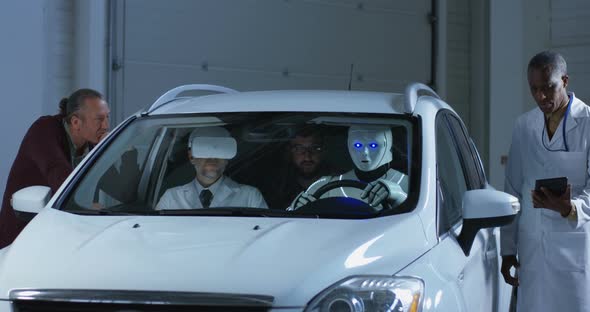 Scientists Testing a Car Driving Robot