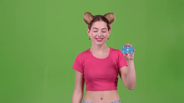 Girl Advertises a Card and Shows a Ok. Green Screen