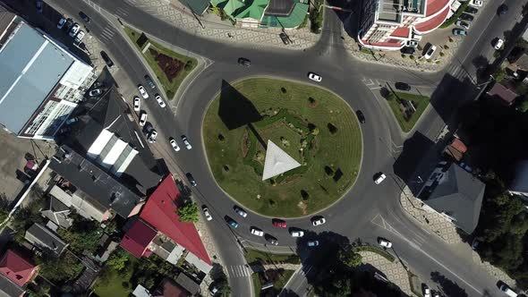 City Roads From Above - Top Down View of Modern Road Circle Intersection in August