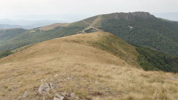 Mountain ranges of Stara planina slow tilt 4K 2160p 30fps UltraHD footage - View to Babin zub from  