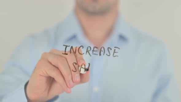 Increase Sale, Man Writing on Transparent Glass Screen