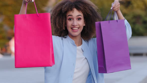Portrait Afro American Ethnic Mixed Race Girl Woman Female Shopper Model with Curly African Hair