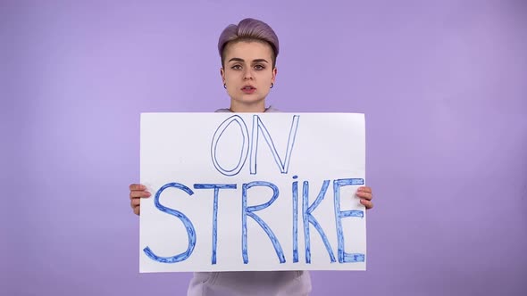 Young Person Generation Z Protesting Holding Poster ON STRIKE Isolated