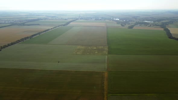 Aerial Drone View Flight Over Different Agricultural Fields