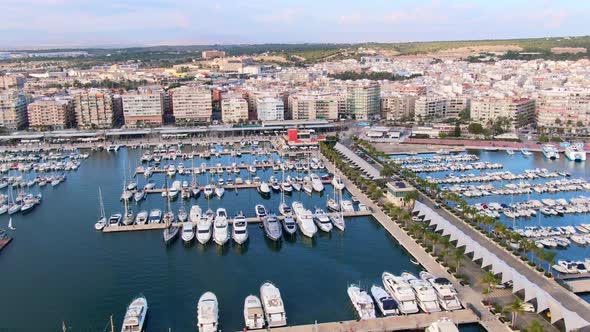 Puerto Santa Pola, Alicante, Spain. Boats And Yachts In Spanish Coastal Docks.