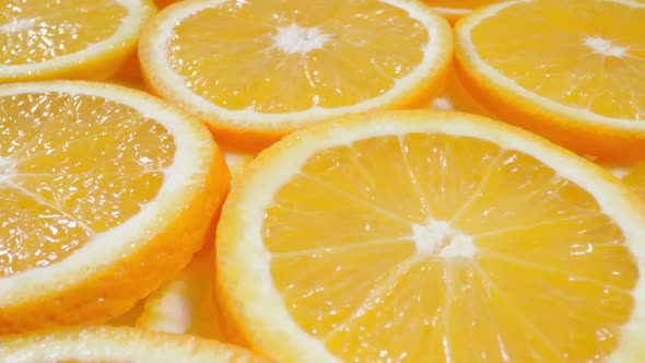 Macro Dolly Shot of Fresh Juicy Orange Fruit Slices