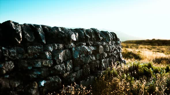 Scottish Land Border Stone Wall at Sunset