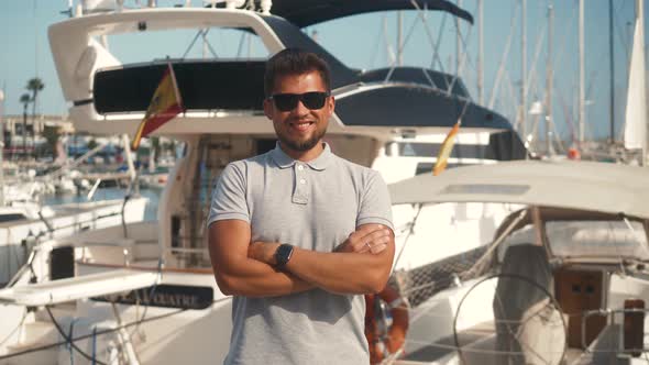 Man Dressed in Casual Wear Near Yacht. Happy Adult Bearded Yachtsman Close-up Portrait. Handsome