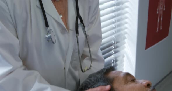 Physiotherapist at work in a hospital alt