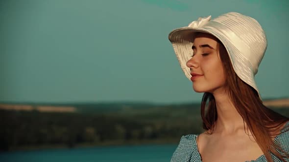 Model Appearance Posing Against a Beautiful Landscape