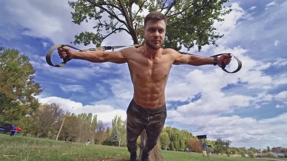 Man doing fitness exercises. Fitness man during training workout