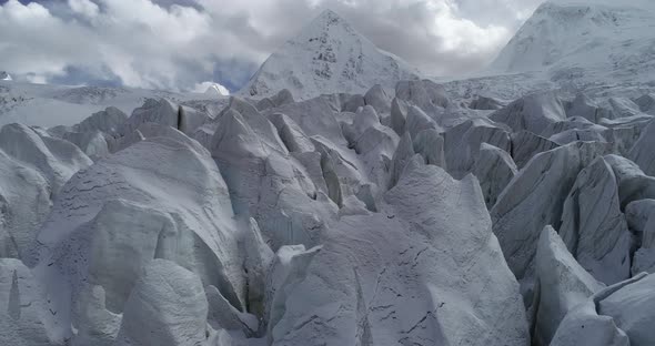 Flying drone approaching fossil glacier in tibet, China