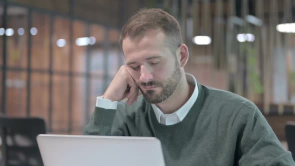 Close Up Shoot of Tired Man Having Nap on Desk