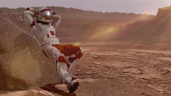 Astronaut Sitting on Mars and Admiring the Scenery alt