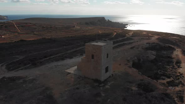 Aerial drone video from northern Malta near the Ghajn Znuber Tower.