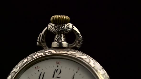 Pocket Watch with Vintage Design Closeup Rotate Black Background