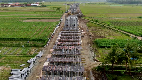 Monorail construction site on Java, aerial view of concrete foundation piles