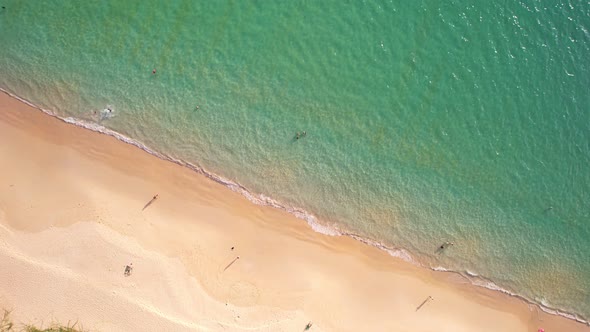 High quality footage.Colorful Sea beach beautiful waves Foaming and Splashing on the beach sand