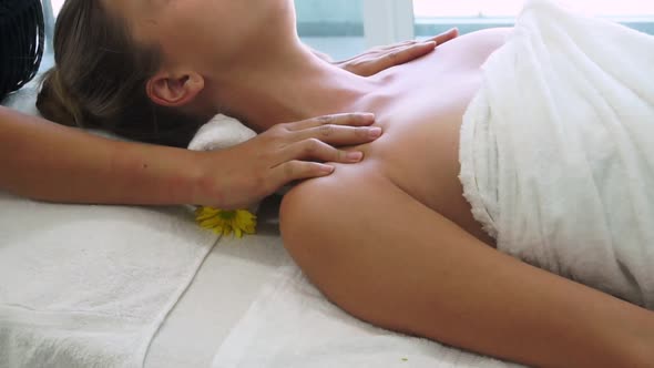 Woman Gets Shoulder Massage Spa By Therapist