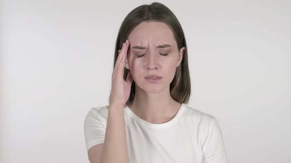 Young Woman with Headache on White Background
