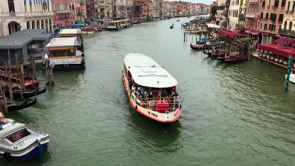 Tourist Boat Sailing on Water Channel in Venice