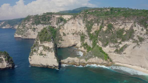 Aerial View of Diamond Beach in Nusa Penida Island Beautiful Ocean Mountains