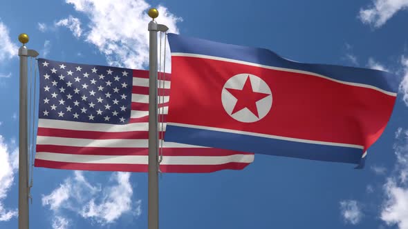 Usa Flag Vs North Korea Flag On Flagpole