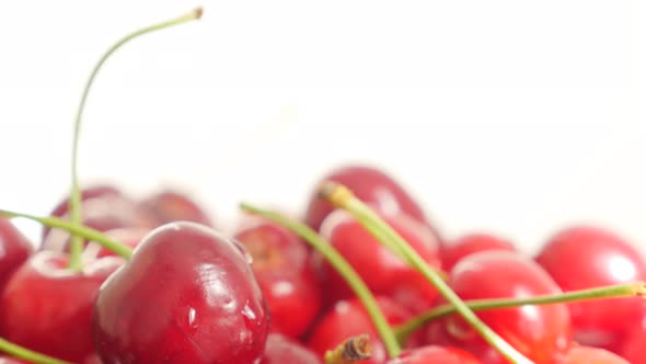 Red healthy Prunus cerasus pile  fruit and food background 4K 3840X2160 UltraHD video - Slow tilt on