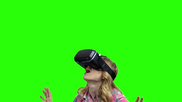Smiling Young Woman in Virtual Reality Glasses