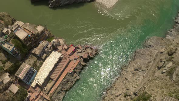 Devprayag, India, alakananda and bhagirathi holy rivers mix to become ganges, 4k aerial drone view