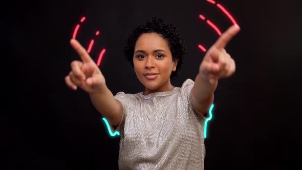 Happy Young Woman Dancing with Glowing Lines