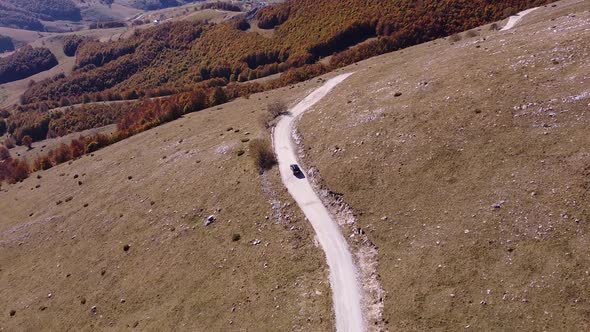 Car Driving On Mountain Road