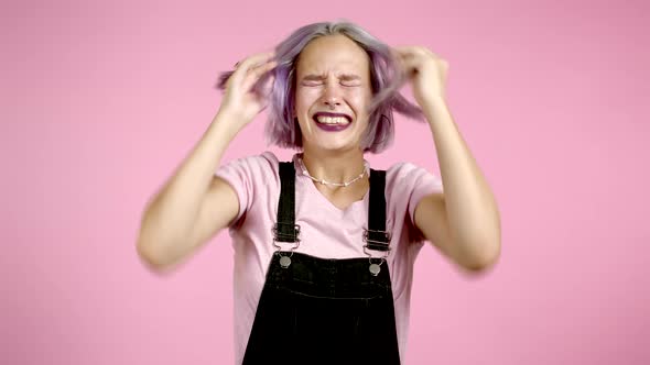 Frightened Hipster Woman Shocked Isolated Over Pink Background. Stressed and Depressed Girl Because