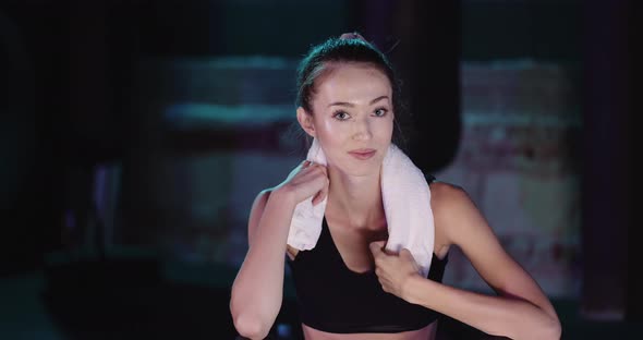 Exhausted Woman Taking Break From Exercise